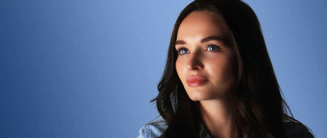 A woman wearing blue lenses 