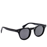 Black sunglasses with dark lenses on a white background