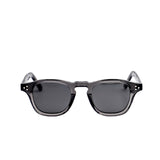 Sunglasses with dark lenses and thin frames on a white background